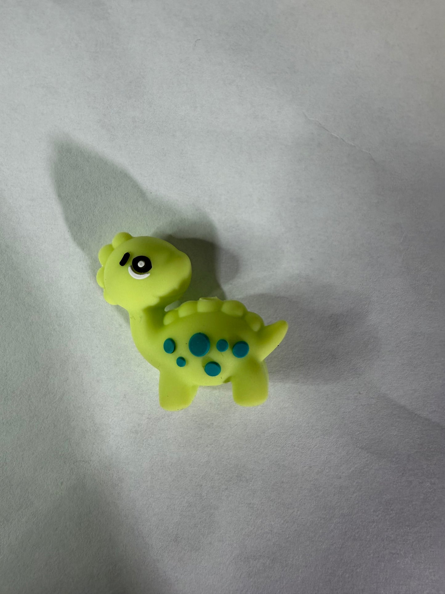 Focal 3d green with blue spots dinosaur