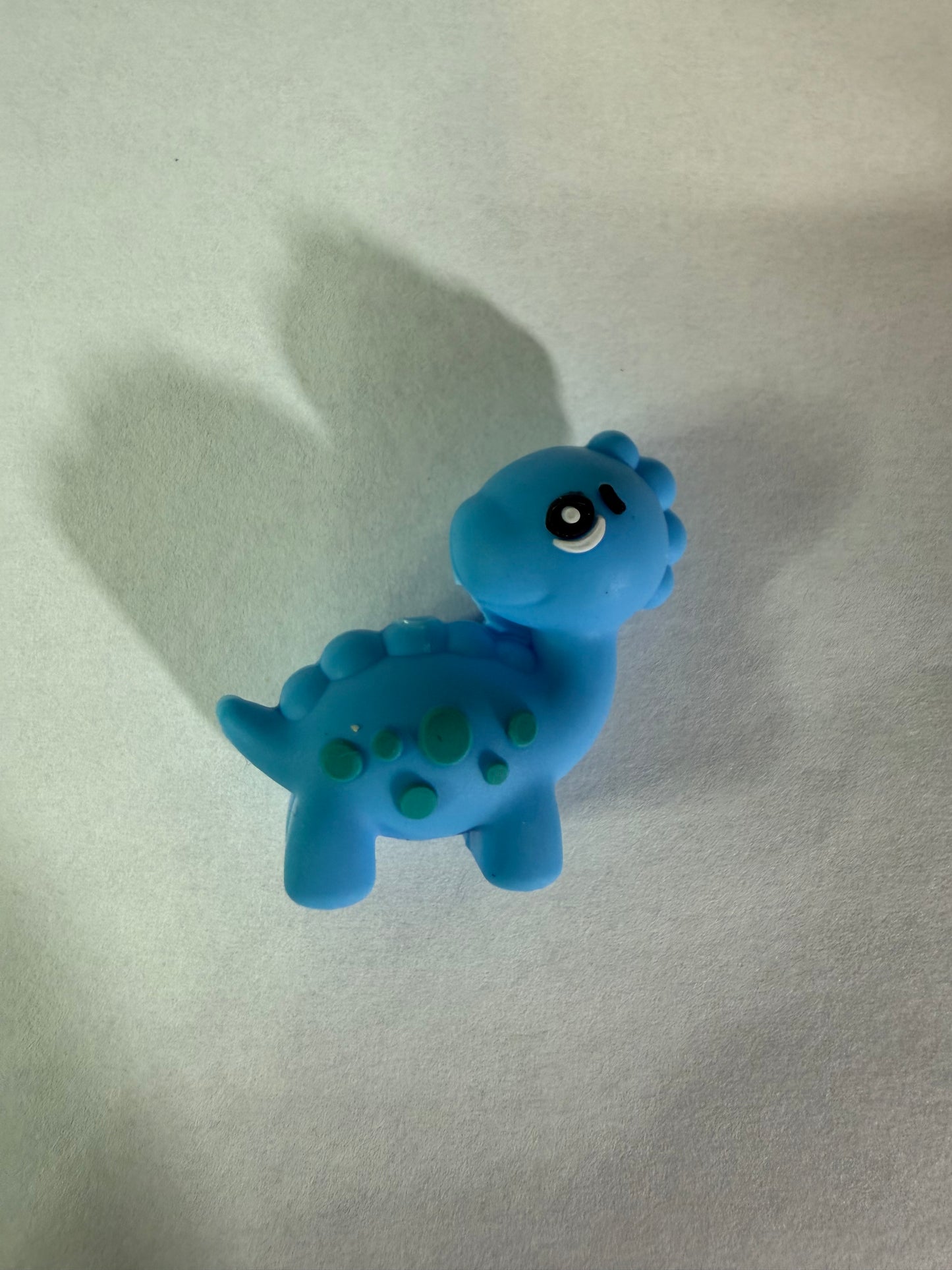 Focal 3d blue with green spots dinosaur