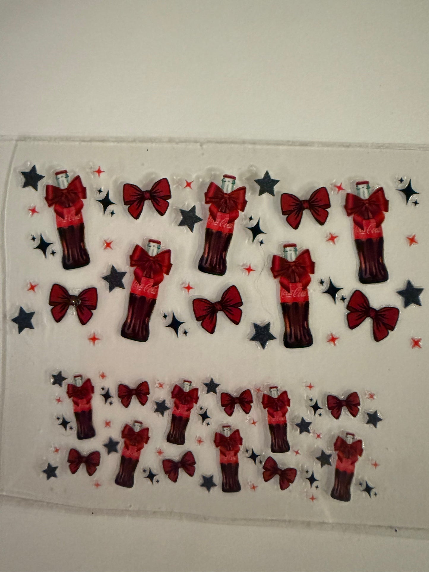 Uvdtf wraps Mini Stanley Coke bottles with bows and stars