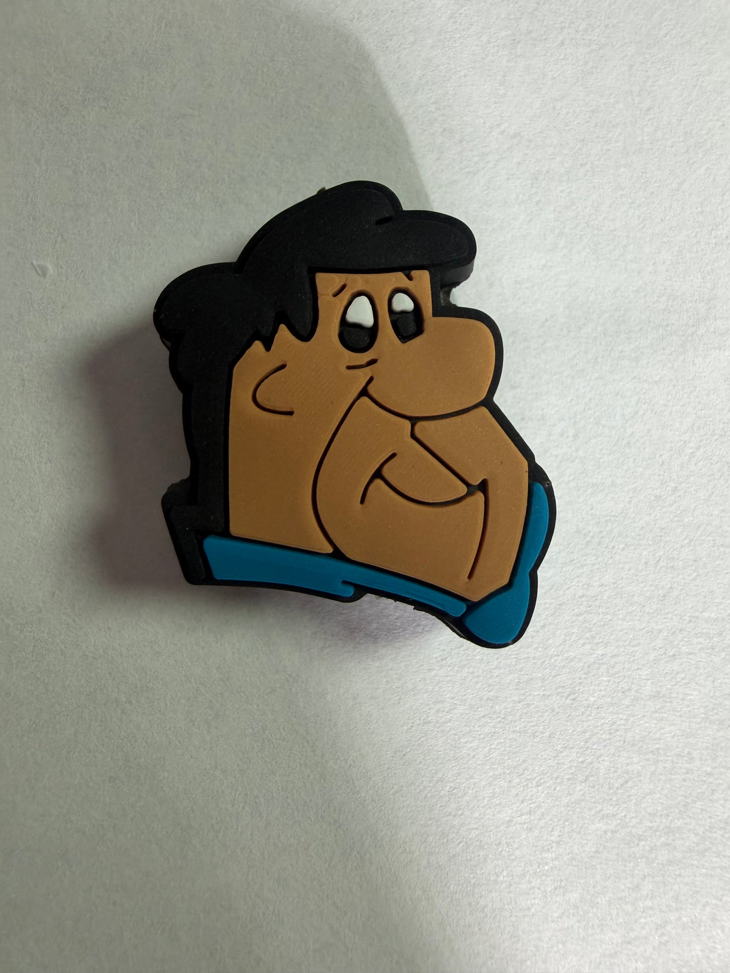 Focal 2d flintstone black hair guy head
