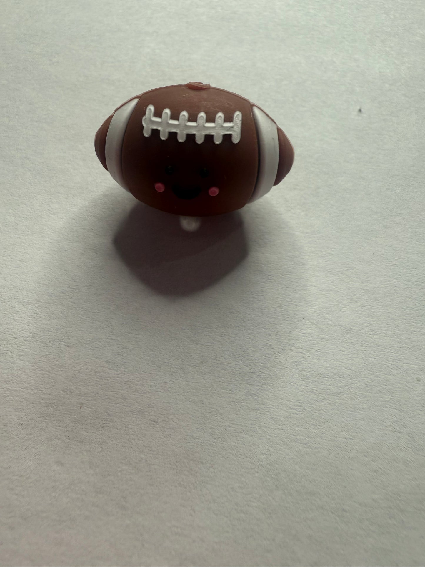 Focal 3d football with smile face