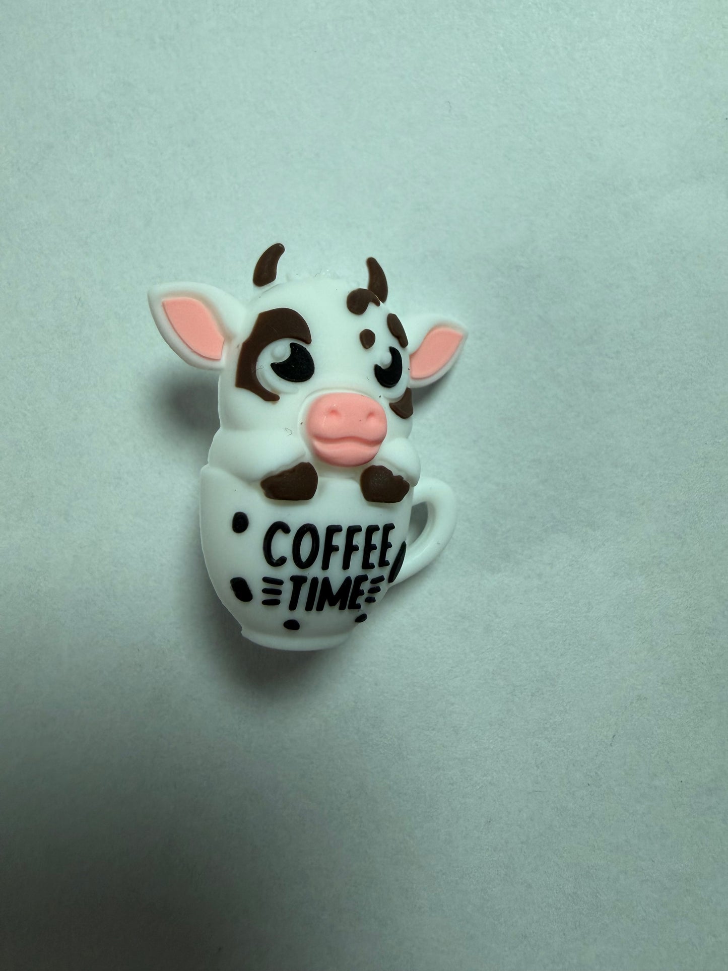 Focal 3d cow in coffee cup