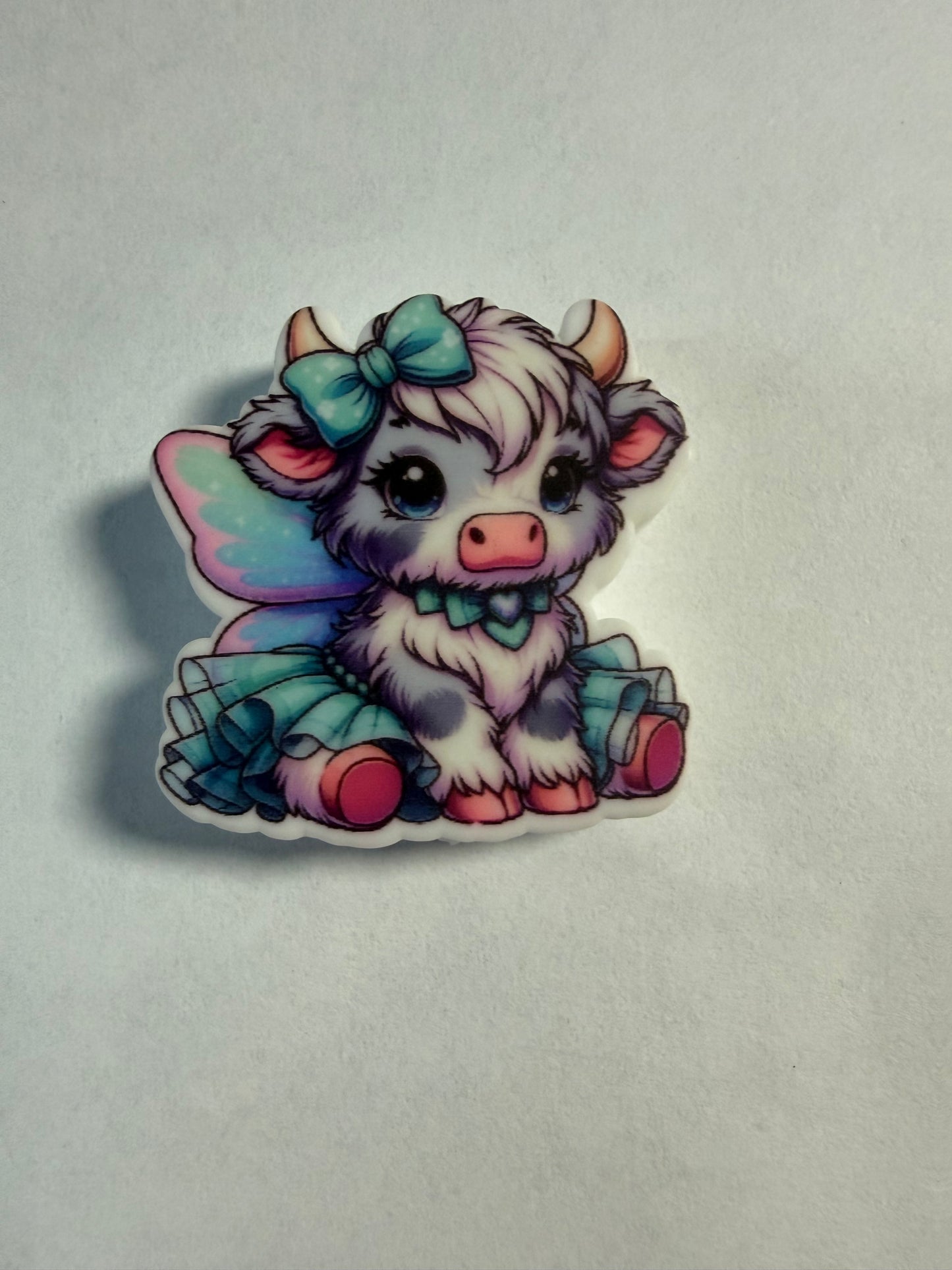 Focal 2d highland cow butterfly