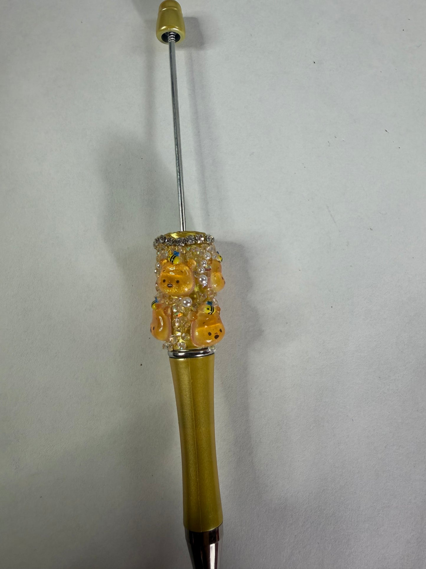 Beadable pens just the pen Half done Pooh head with bee