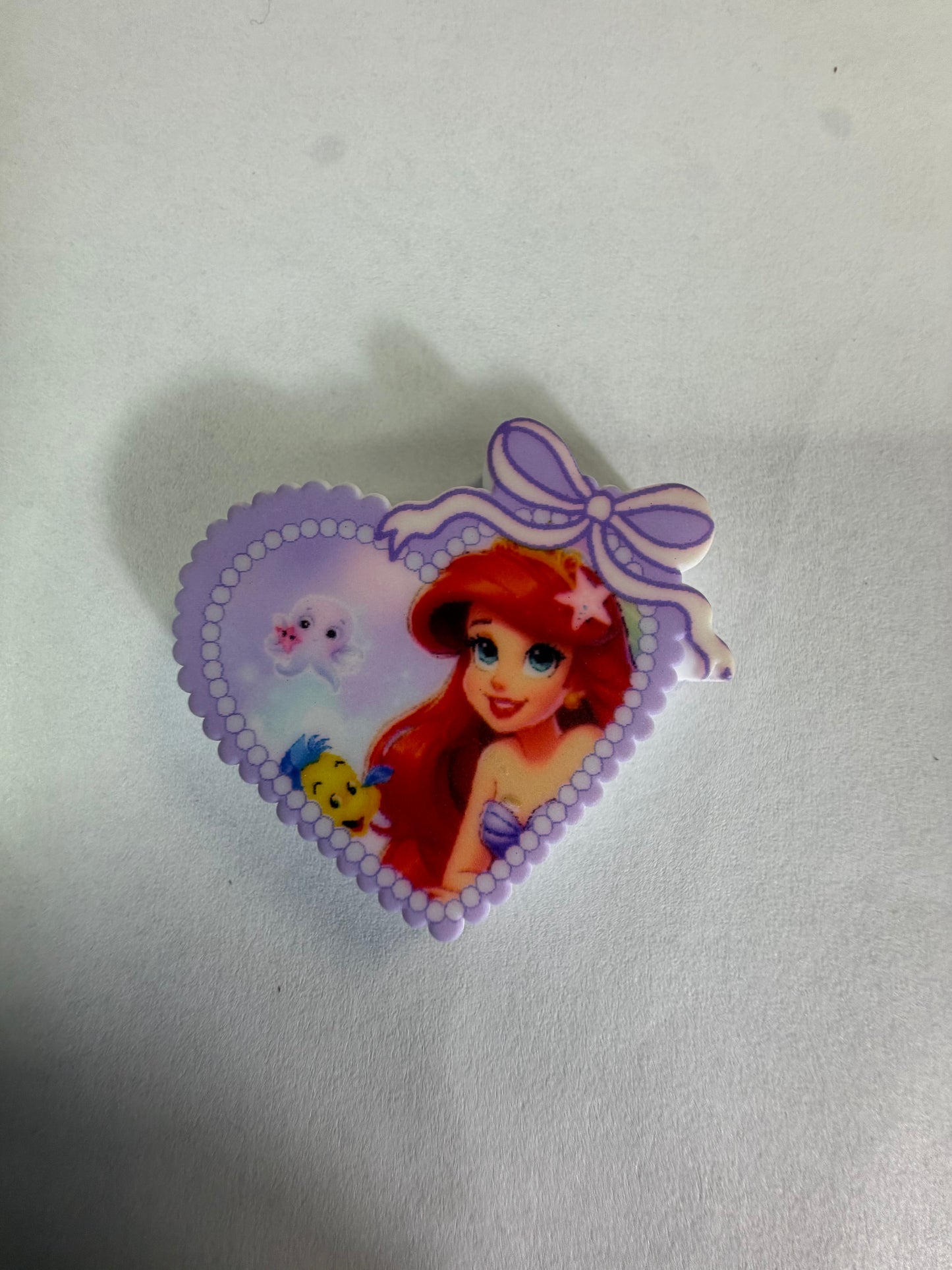 Focal 2d Ariel in heart with bow