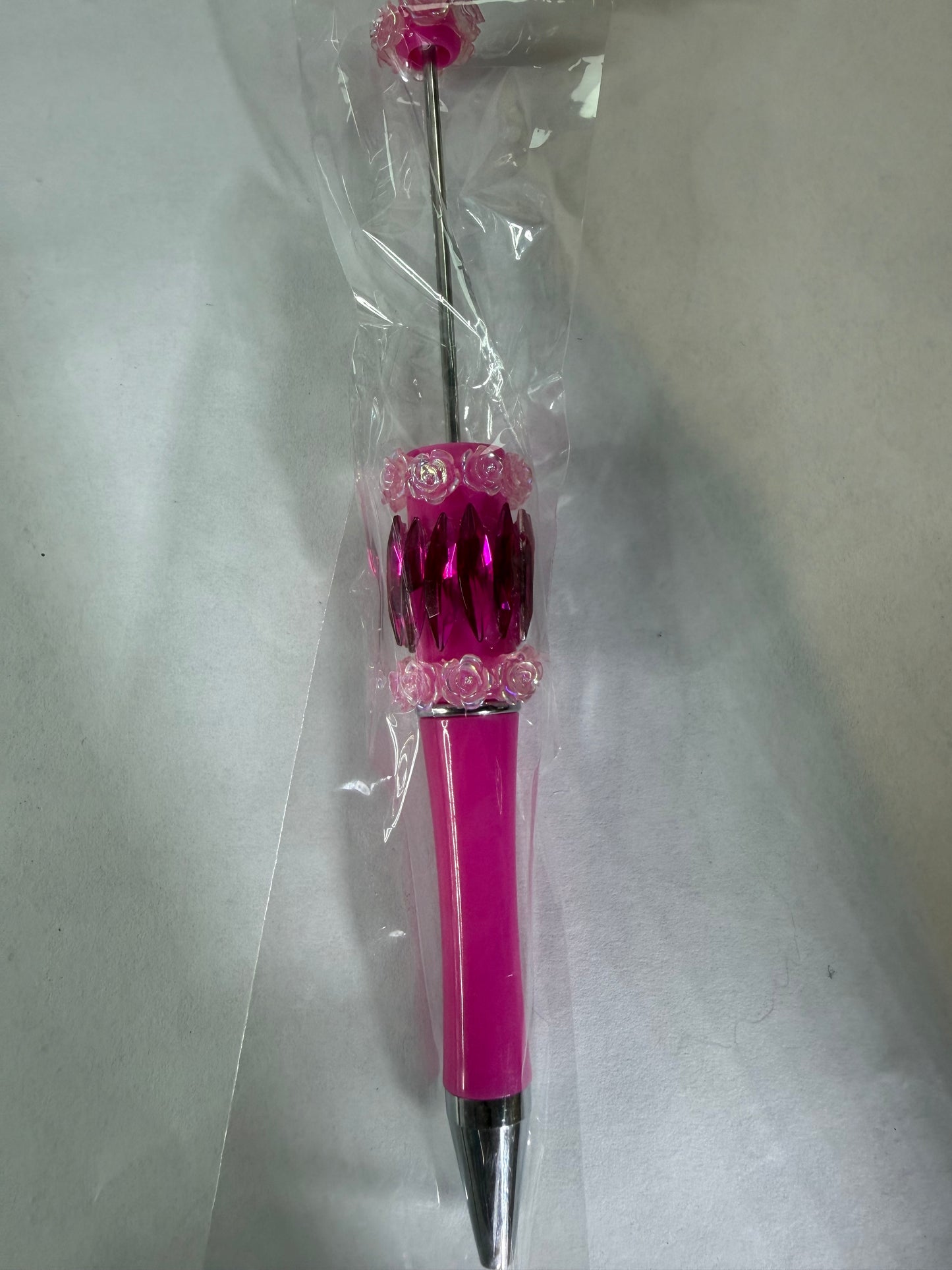 Beadable pen just the pen Half done hot pink gems with rhinestone