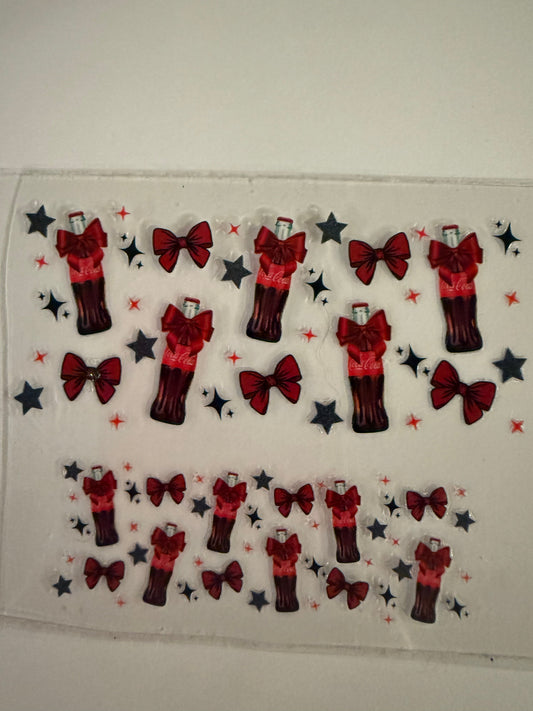 Uvdtf wraps Mini Stanley Coke bottles with bows and stars