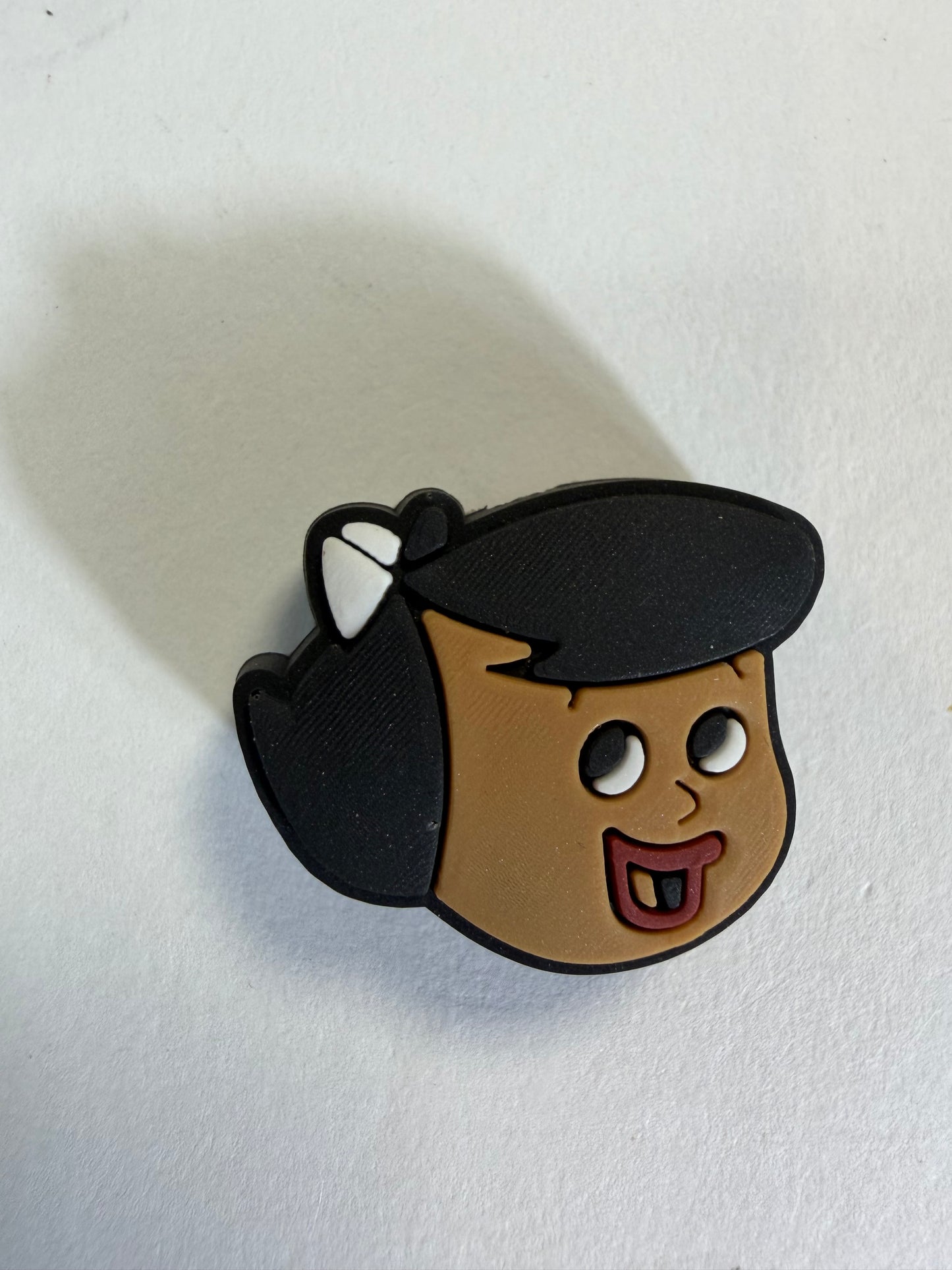 Focal 2d flint stones girl head  black hair