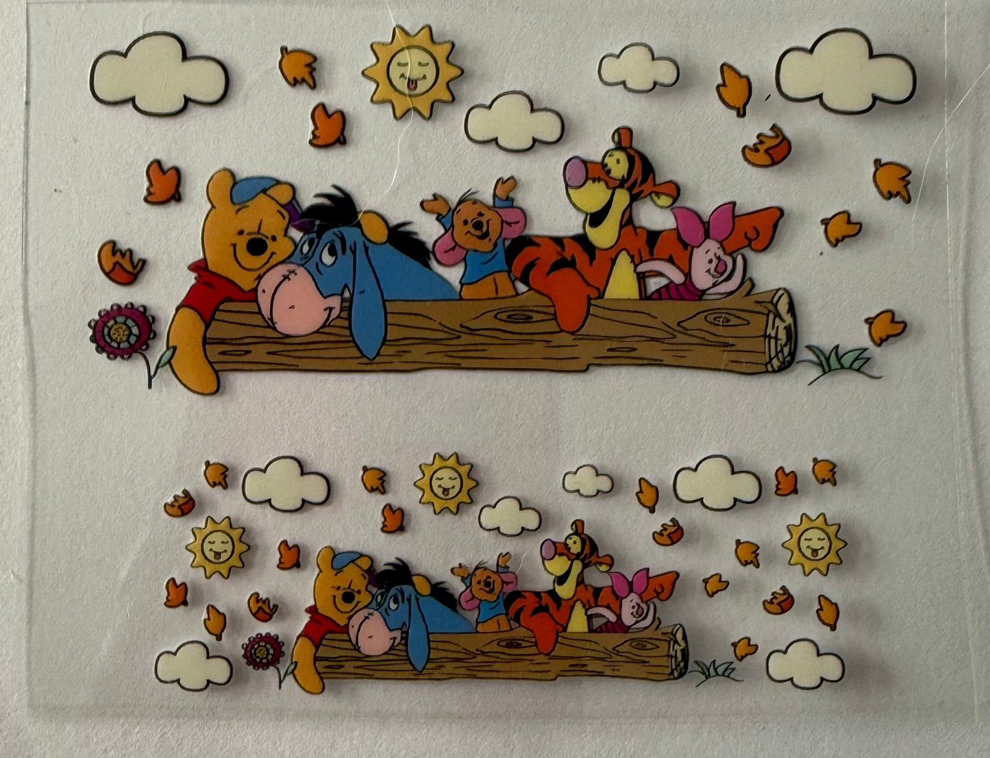 Uvdtf wraps Mini Stanley Winnie the Pooh sitting on a log