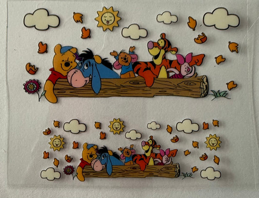 Uvdtf wraps Mini Stanley Winnie the Pooh sitting on a log