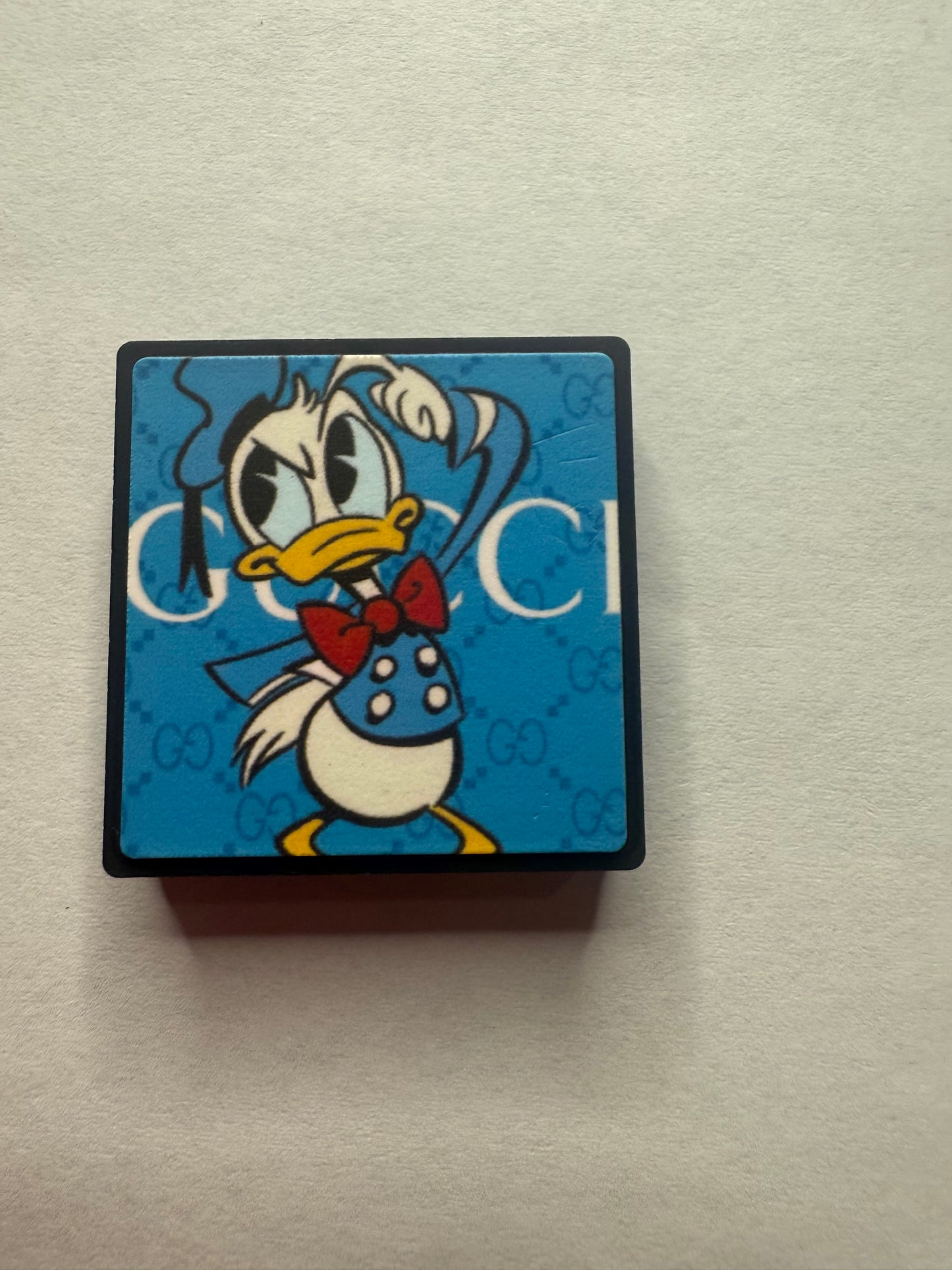 Focal 2d Gucci with Donald Duck on it