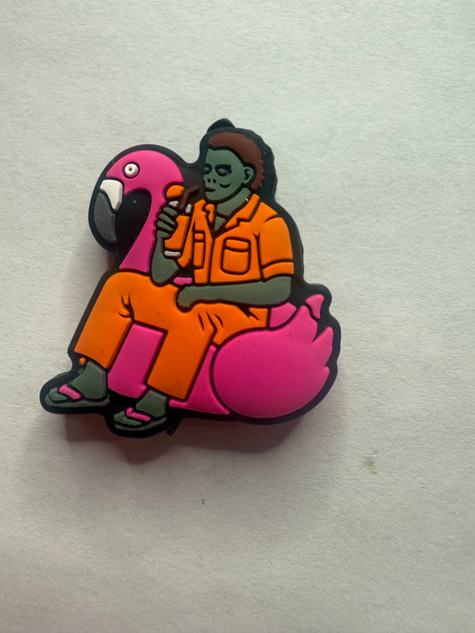 Focal 2d  Michael Myers, sitting on a flamingo pool float