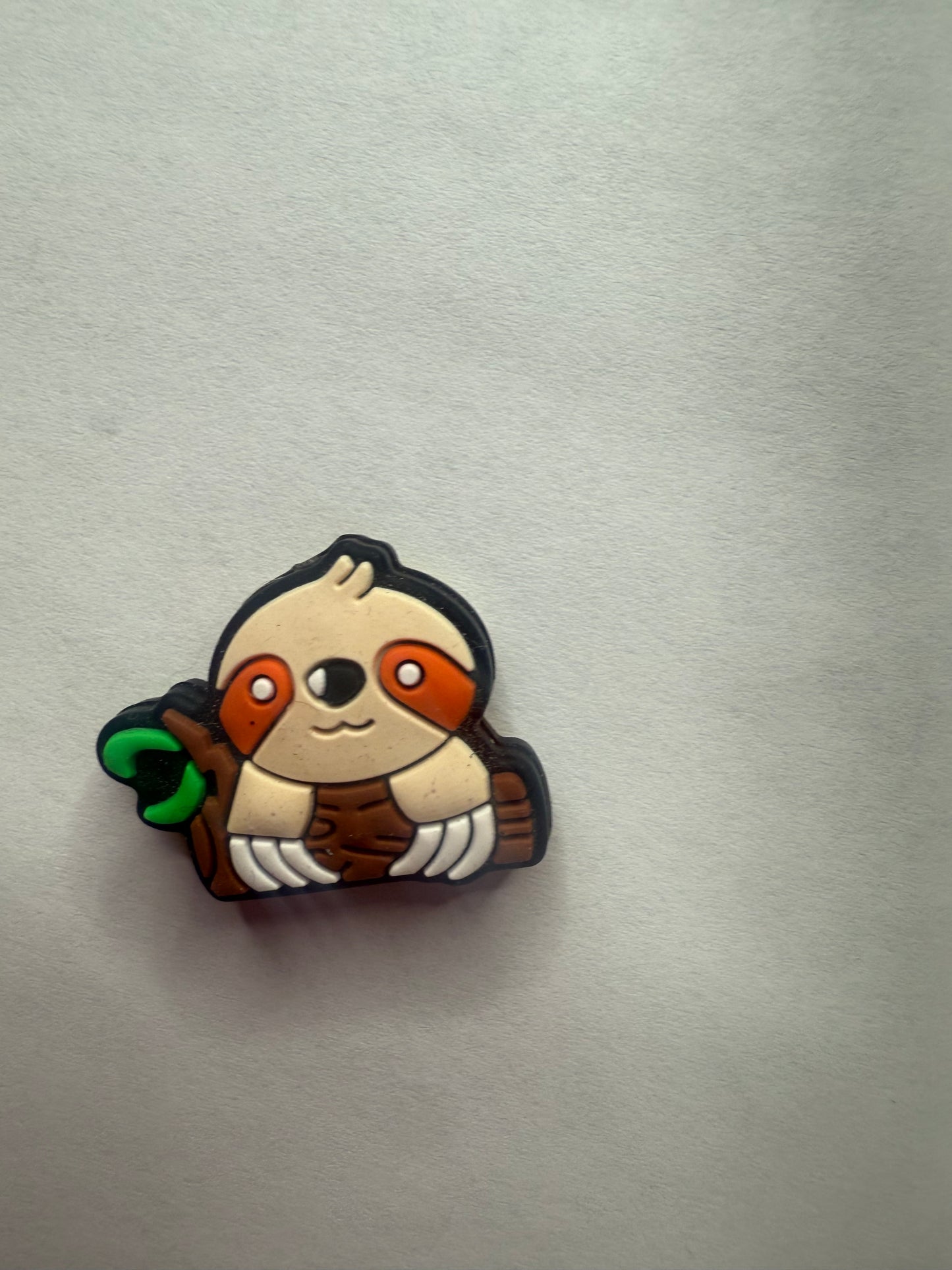 Focals 2d Sloth head with branch