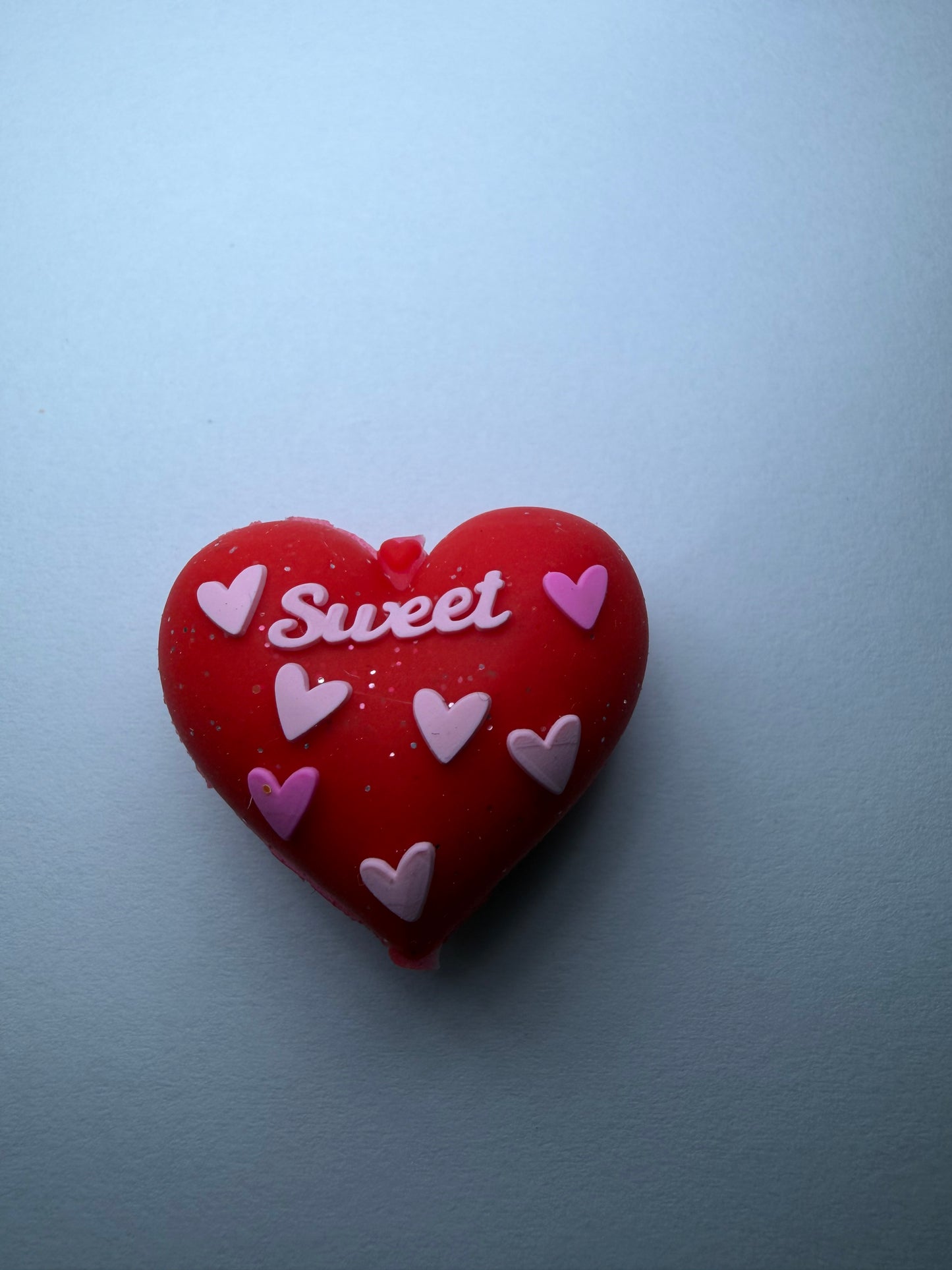 Focal 3d red glitter heart with sweet on it