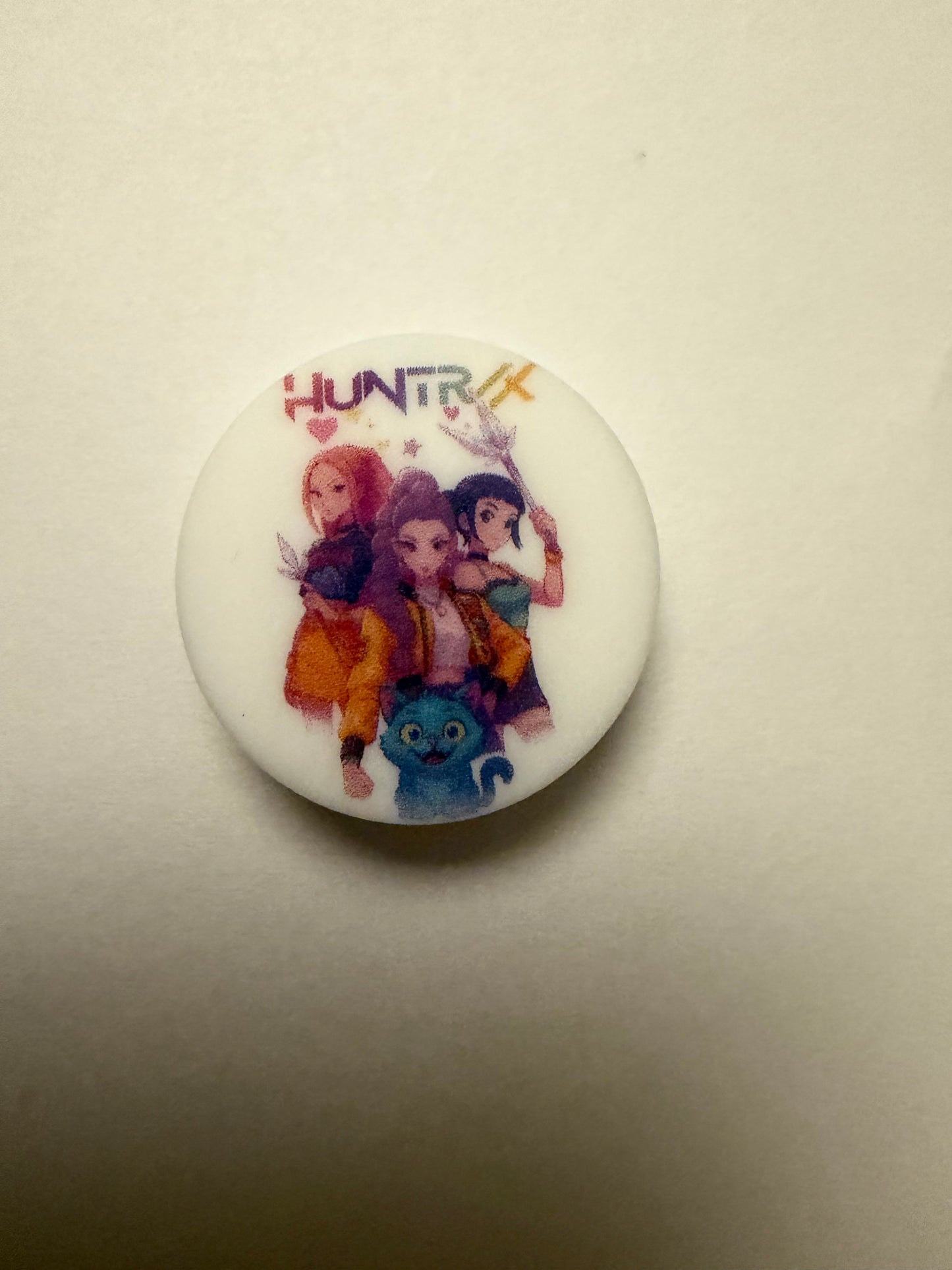 Focal 2d circle K-pop huntrix with girls on it