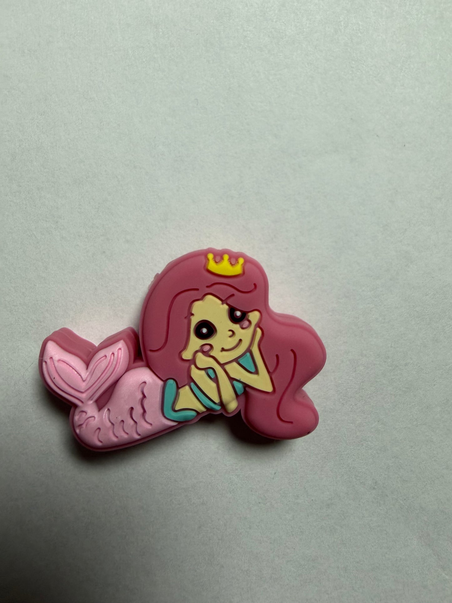 Focal 2d pink mermaid laying down