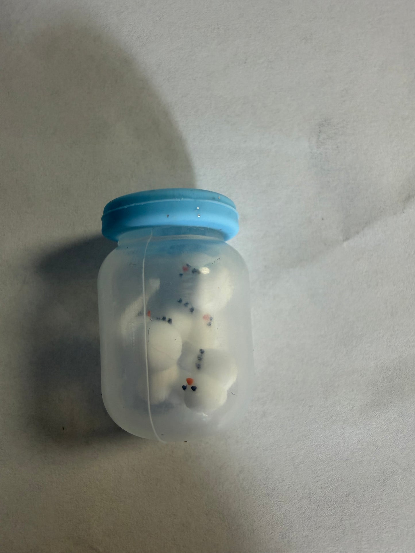 Focal 3d jars with snowman inside