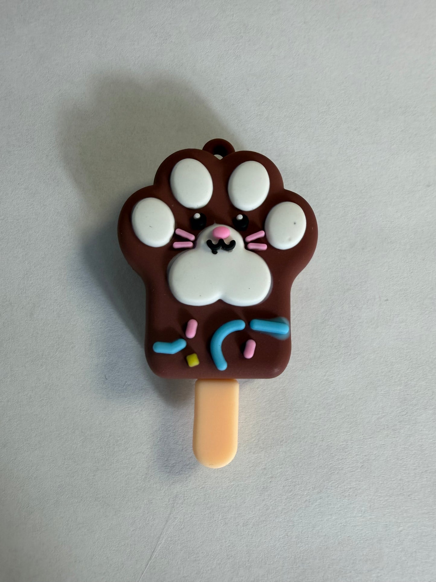 Pen topper silicone Brown cat popsicle paw print