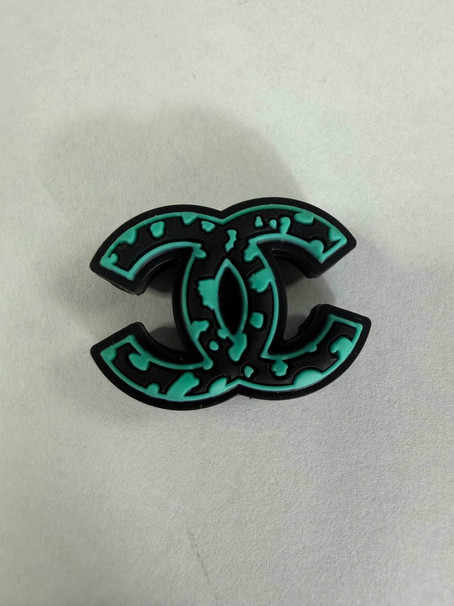 Focal 2d cc teal and black letter