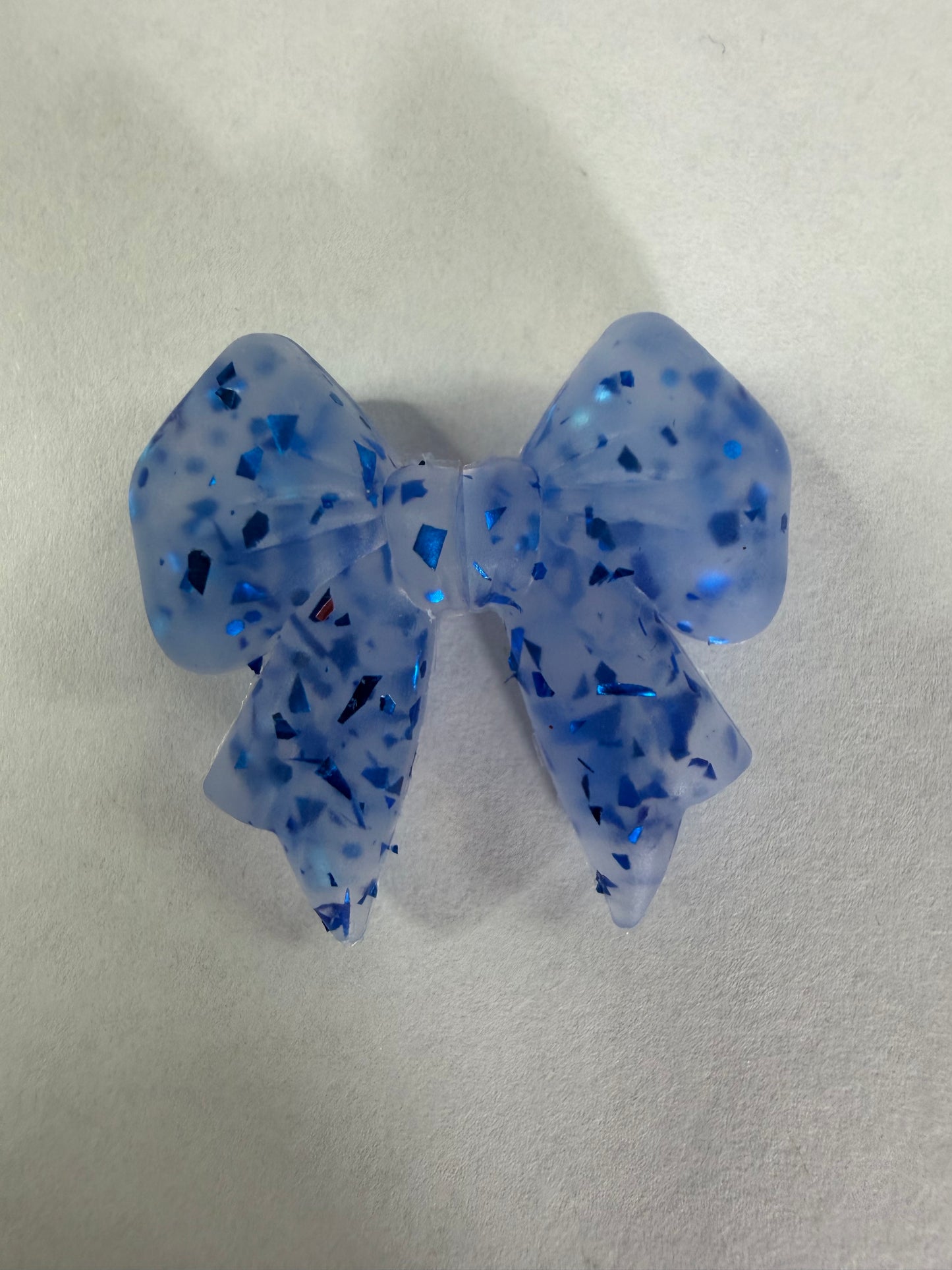 Focal 3d glitter inside blue bow