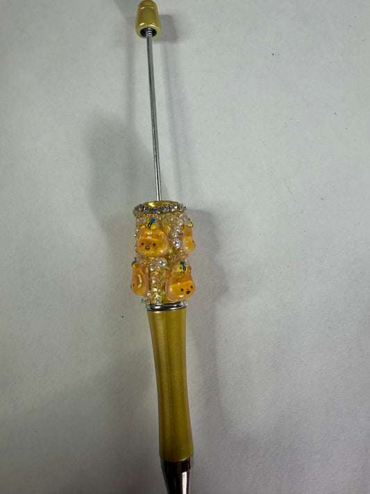 Beadable pens just the pen Half done Pooh head with bee